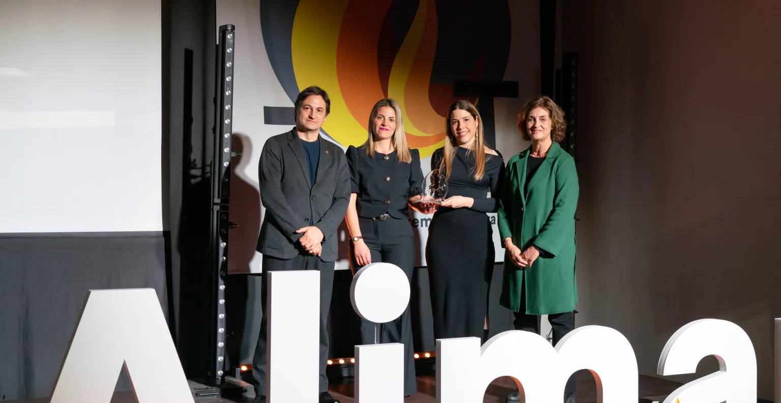 Foto de l'equip de Xocolates Simón Coll rebent el premi